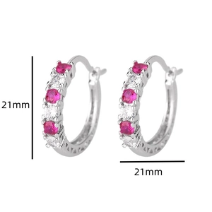 Detail view of 21mm silver hoop earrings with alternating pink and white zircons