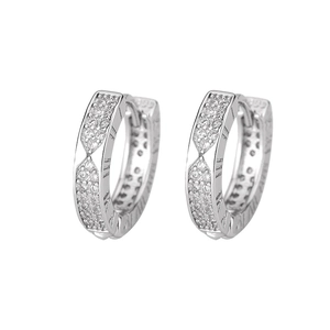 Detailed close-up of silver hoop earrings with roman numerals and cubic zirconia stones