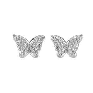 Macro detail of silver butterfly earrings with sparkling cubic zirconia pave setting