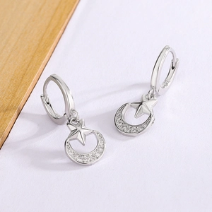 Elegant S925 sterling silver star and moon earrings with cubic zirconia and polished finish