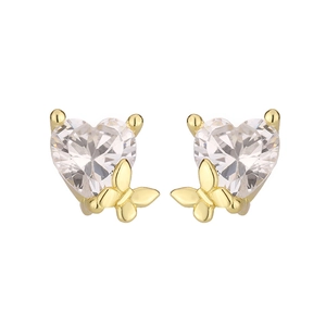 Close-up of heart-shaped zircon stud earrings with golden butterfly base detail