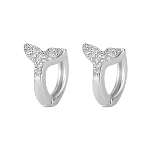 Close-up of silver fishtail hoop earrings with micro-set shimmering cubic zirconia