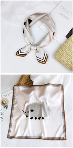 Detailed view of beige silk scarf featuring hedgehog prints and elegant striped borders