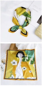 Detailed pattern of floral square silk scarf with artistic female portrait and green edges