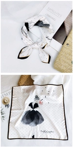Detailed close-up of a square silk scarf with fashion illustration and black polka dots
