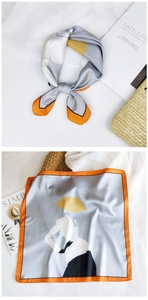 Detailed macro view of the digital print on a fashion square silk scarf for women
