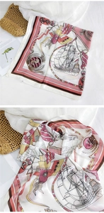 Detail view of nautical print silk scarf featuring anchors, sailboats, and striped borders