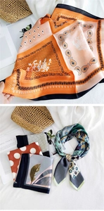 Detailed view of silk-texture square scarves with floral and geometric patterns