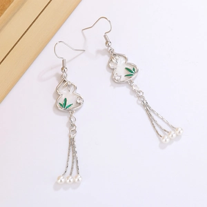 Elegant silver gourd earrings with green bamboo leaves and long pearl tassels