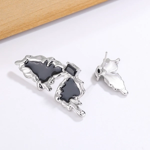 Liquid silver metal stud earrings with black enamel butterfly design and zircon details