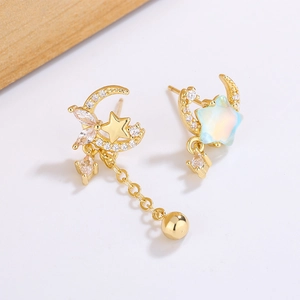 Asymmetric gold moon and star tassel earrings with sparkling white zircons