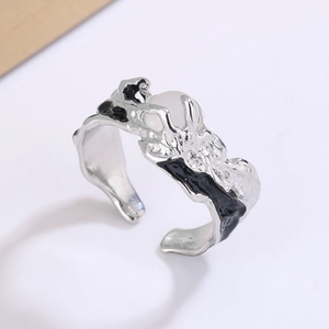 Minimalist irregular textured open ring with moonstone and black enamel details