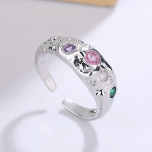 Adjustable silver hammer textured ring featuring four colorful round zircon stones