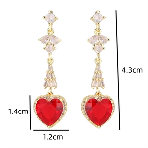 Detail view of heart-shaped red zircon earrings with gold plating and size measurements