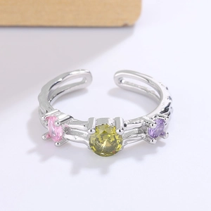 Adjustable silver ring with colorful irregular zircons including yellow and pink stones