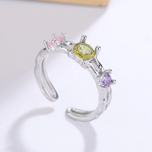 Irregular textured silver open ring with three colorful zircon stones in a row