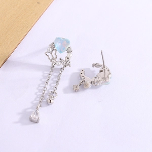 Elegant asymmetrical heart and moon drop earrings with tassel and light blue stones