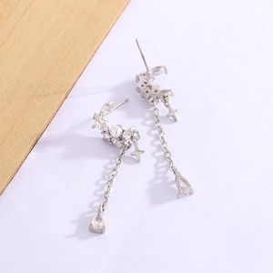 Silver star and moon dangle earrings with white faux pearls and cubic zirconia stones