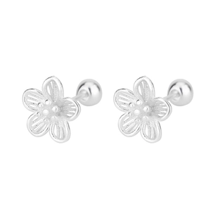 Detail of silver hollowed flower stud earrings with brushed metal finish and screw back