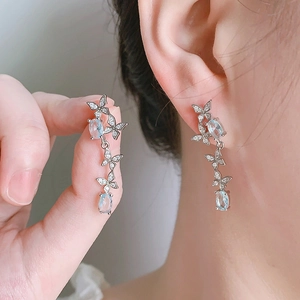Elegant blue butterfly drop earrings with sparkling stones for a sophisticated style