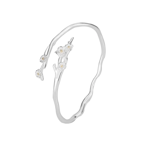 Elegant silver jasmine branch open bangle with delicate flower details on white background