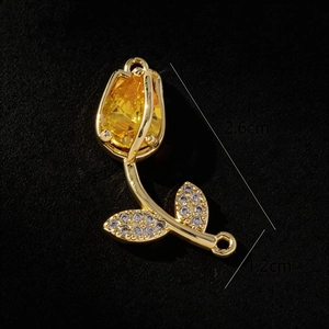 Macro detail of tulip pendant with yellow drop gemstone and micro-pave crystals