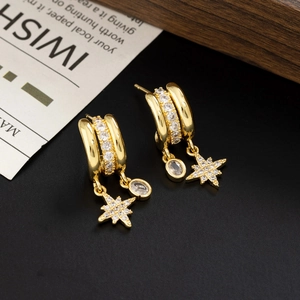 Elegant gold-plated star dangle earrings with pavé zircons and oval stone in 45-degree view