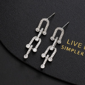 Minimalist silver U-shaped earrings with chain links and clear zircon stones in pave setting