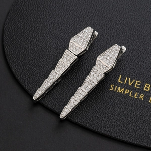 Elegant silver snake earrings with sparkling cubic zirconia in a long drop style