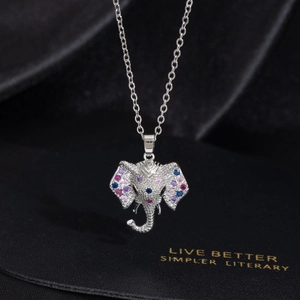 Detailed view of silver elephant pendant necklace with colorful micro-set cubic zirconia