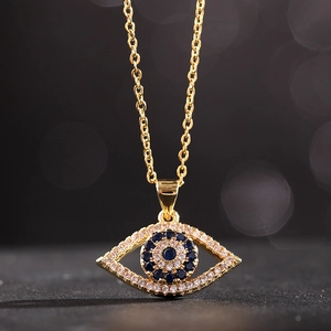Collar con colgante de Ojo Turco dorado con circón azul y cristales brillantes