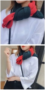 Detail of chunky knit texture on contrast red and black winter scarf for women