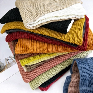 Thick two-tone knitted scarf for winter in various colors with a soft chunky texture
