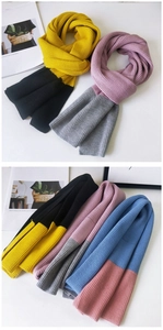 Detailed view of bicolor vertical ribbed knit texture on warm winter scarves