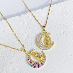 Gold moon pendant necklace with micro-pave zircons and Virgin Mary relief on stone