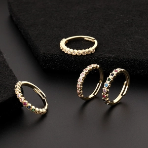 Adjustable gold plated ring set with colorful zircon stars on premium black background