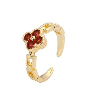 Adjustable gold plated clover ring with red zircon gemstones and chain band design