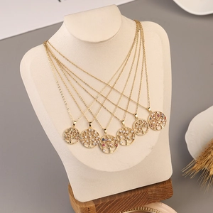 Tree of Life necklace collection with colorful cubic zirconia pendants on gold chains