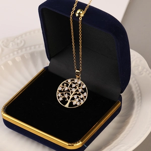 Golden Tree of Life necklace with cubic zirconia pendant in a luxury blue velvet box