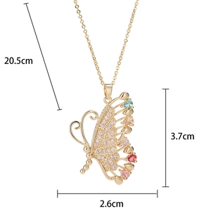 Détails d'un collier papillon doré avec cristaux colorés et mesures de la taille