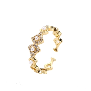 Minimalist geometric gold open ring with four white pearls and zircon accents