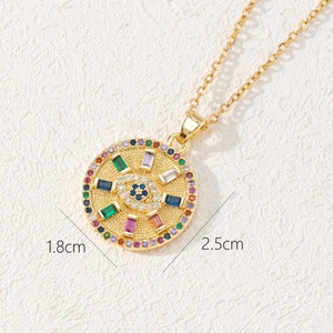 Macro shot of bohemian evil eye coin pendant with colorful zircon stones and gold plating