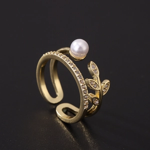 Elegant gold plated open ring with pearl and leaf motif set with zircon stones