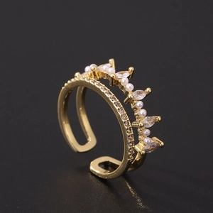 Macro shot of double-layer gold adjustable ring with pearls and marquise zircons