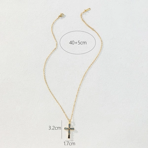 Detailed size view of a gold cross necklace with dark stones and 40+5cm chain specs