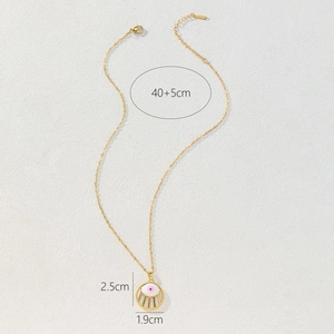 Dettaglio della collana dorata 40+5cm con ciondolo malocchio e perline in zircone colorato