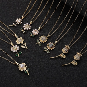 Luxurious gold plated copper necklaces with assorted zircon flower pendants on black leather