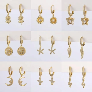 Set di orecchini a cerchio dorati con ciondoli in zirconia in nove design alla moda