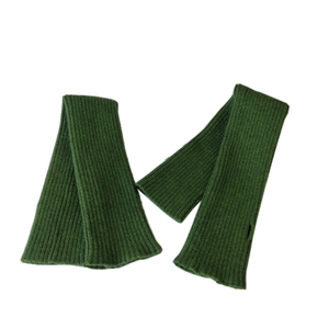 Dark green ribbed knit arm warmers with thumb holes for winter warmth and style