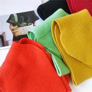 Thick knitted cross scarves in multiple colors for winter warmth and fashion